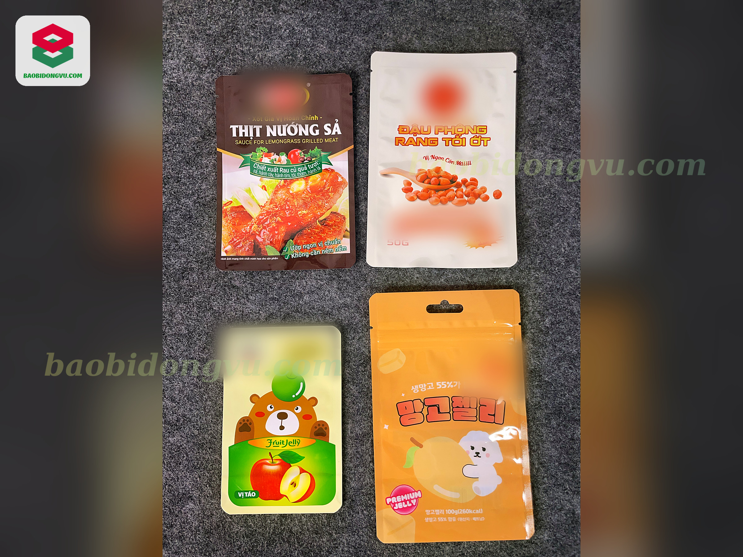 Four printed 3-side seal flat pouches for seasoning sauce, roasted peanuts and fruit jelly, made by Dong Vu Packaging