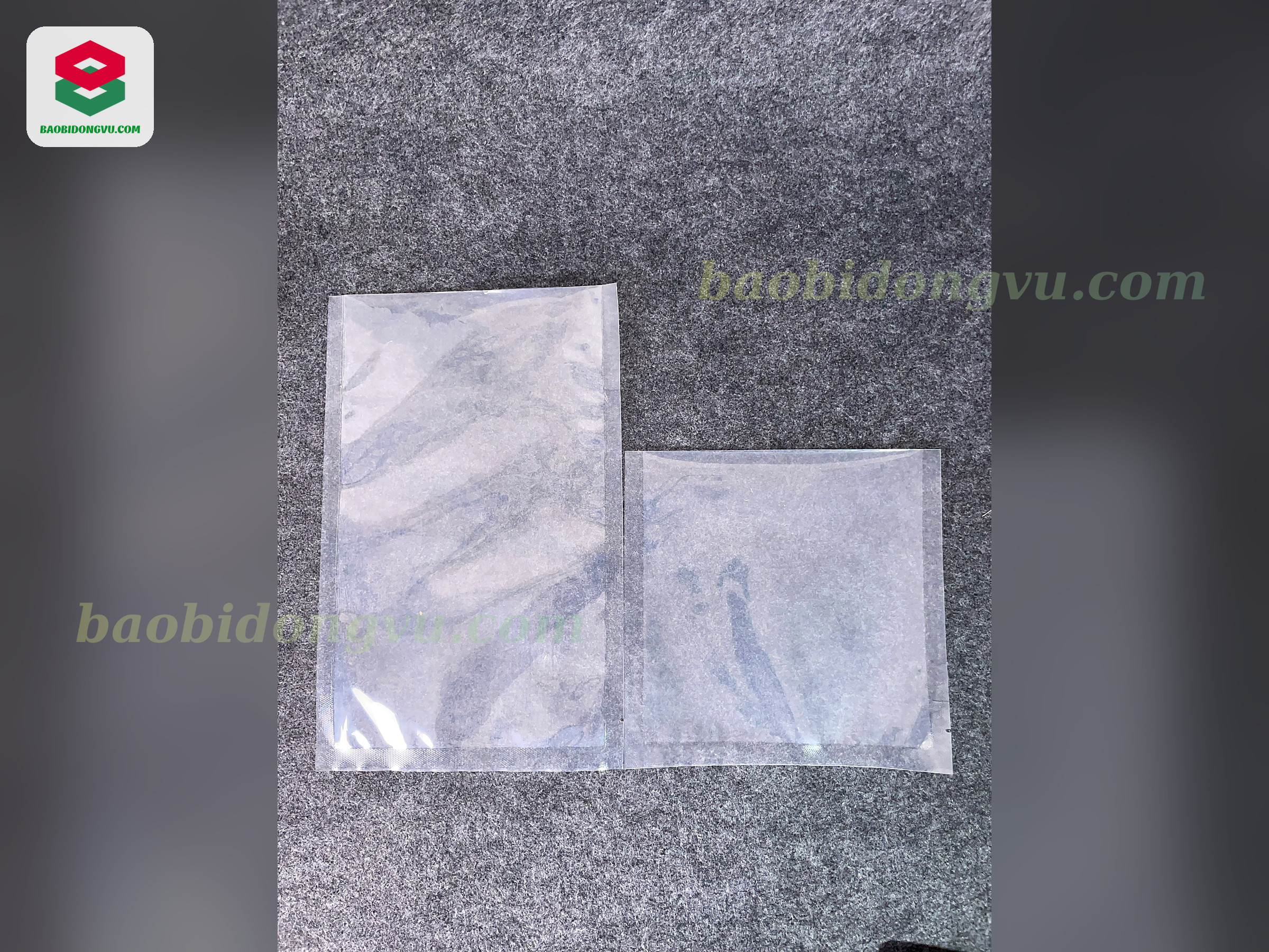 Two clear PA/PE vacuum bags in different sizes, custom made by Dong Vu Packaging in Vietnam