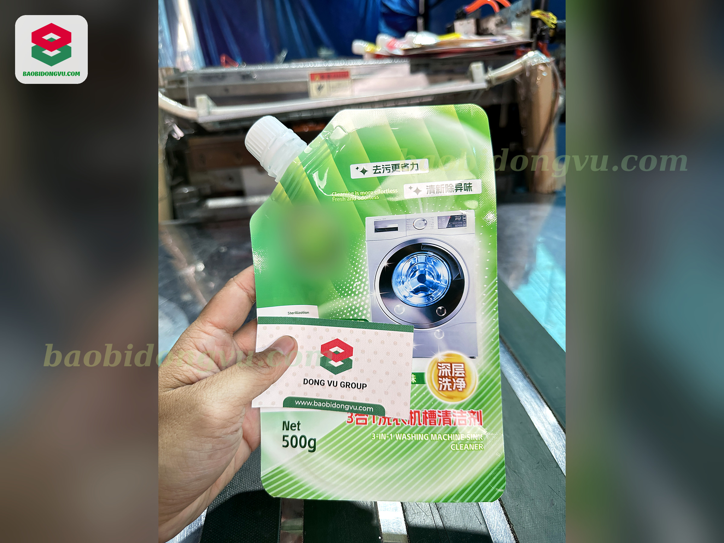 Green 500 g washing machine cleaner spout pouch with machine illustration, printed by Dong Vu Packaging