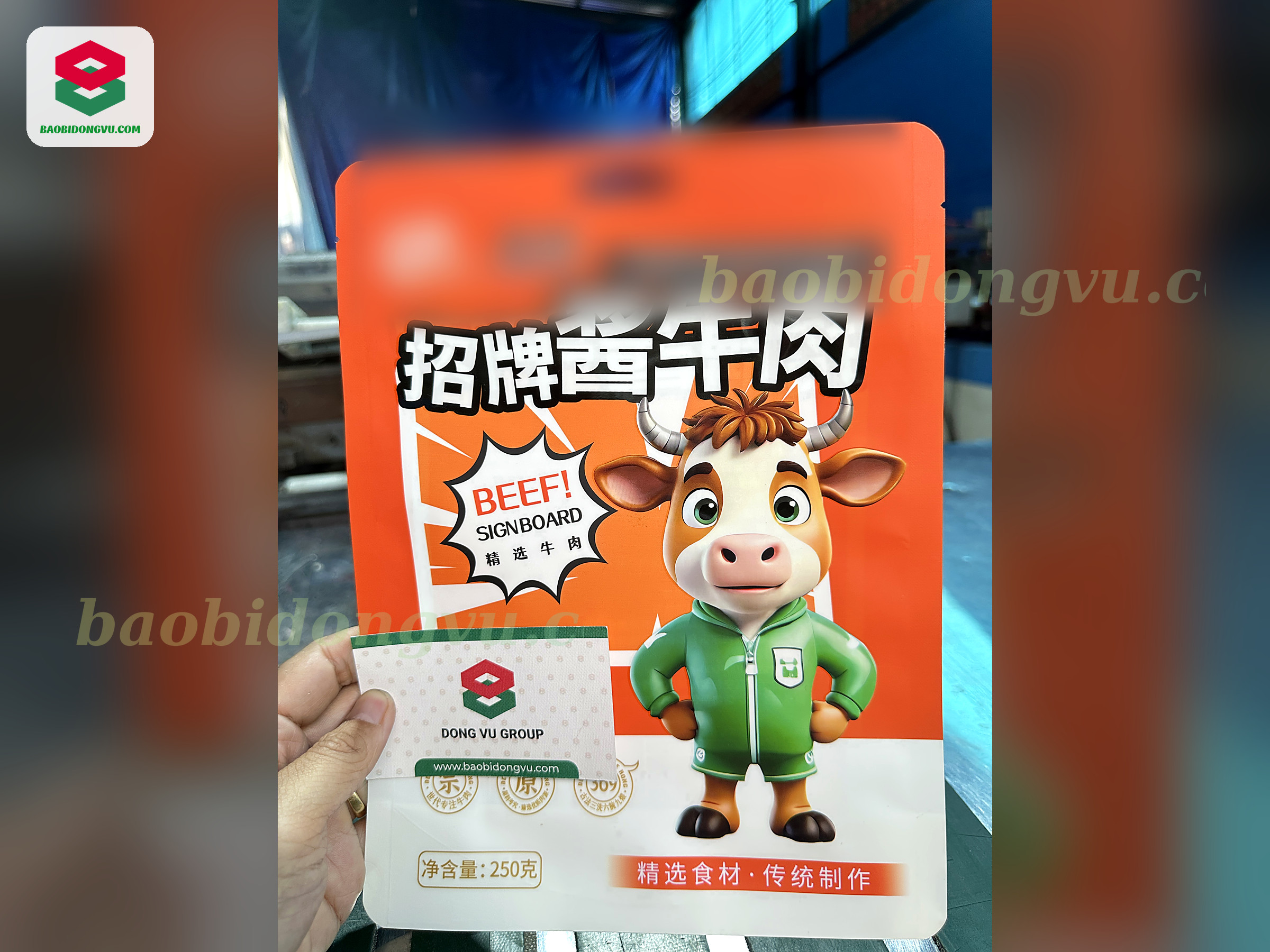 Orange printed stand-up pouch for beef jerky snack with cartoon artwork, Dong Vu Packaging