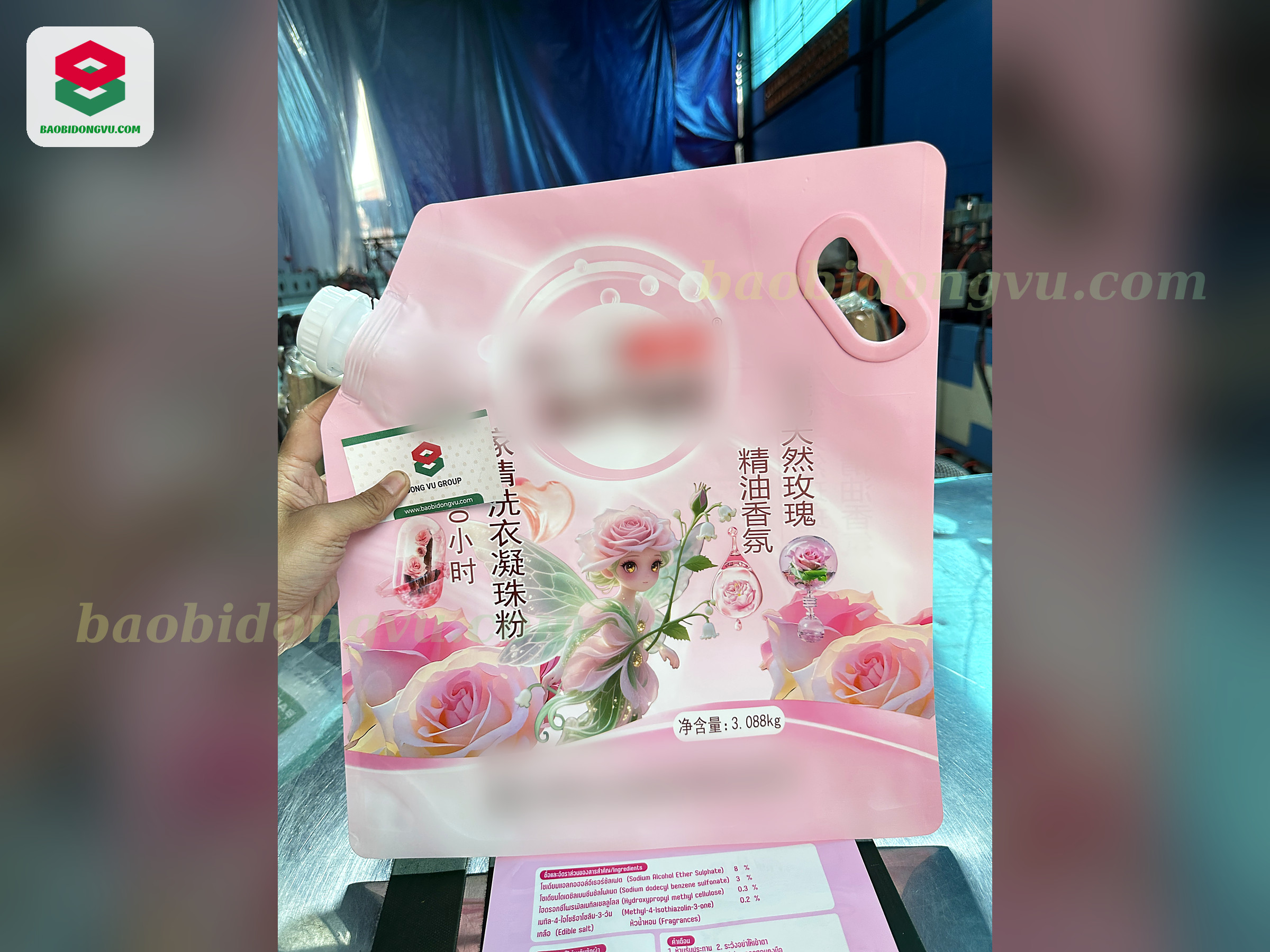 Pink rose-print 3 kg stand-up laundry spout pouch with handle cut-out, made in Vietnam by Dong Vu Packaging